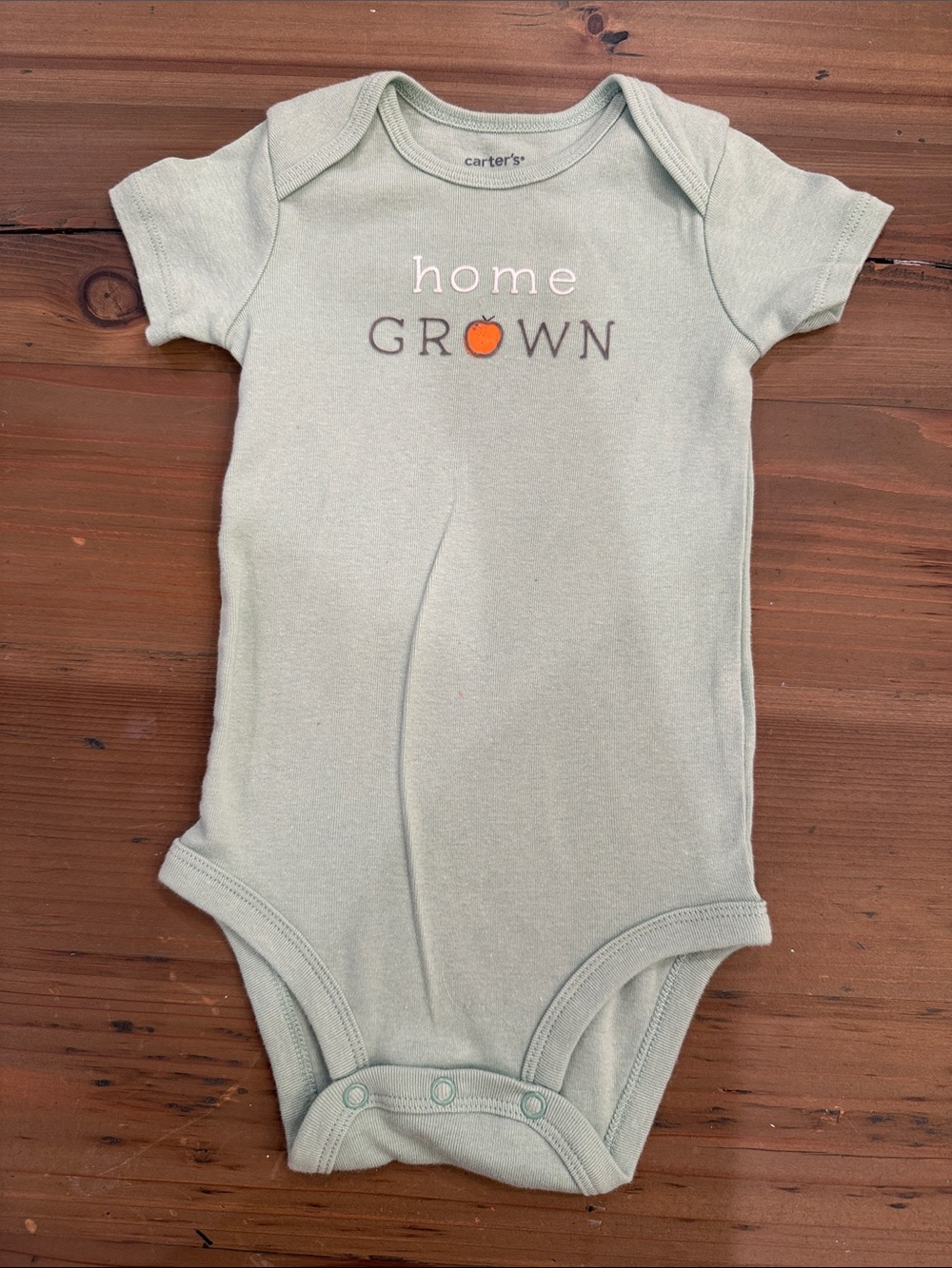 Carter's light sage green "home GROWN" onesie with orange apple